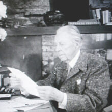 Frank L. Wright reading a letter